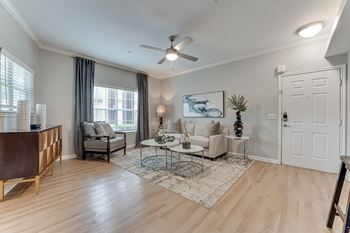 Living room with modern furniture and ceiling fan